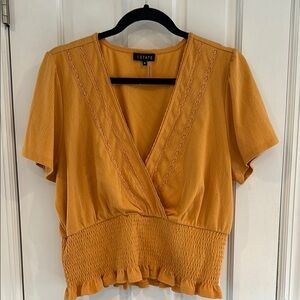 1. State Yellow Short Sleeve Wrap Blouse